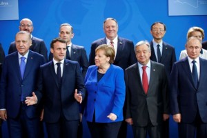 European Council President Charles Michel, German Foreign Minister Heiko Maas, U.S. Secretary of State Mike Pompeo, Yang Jiechi, director of the Office of Foreign Affairs of the Communist Party of China, European Commission President Ursula von der Leyen, Turkish President Recep Tayyip Erdogan, French President Emmanuel Macron, German Chancellor Angela Merkel United Nations Secretary-General Antonio Guterres and Russian President Vladimir Putin pose for a family photo during the Libya summit in Berlin, Germany, January 19, 2020. REUTERS/Hannibal Hanschke