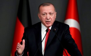 FILE PHOTO: Turkish President Tayyip Erdogan speaks during a news conference in Istanbul, Turkey, January 24, 2020. REUTERS/Umit Bektas/File Photo