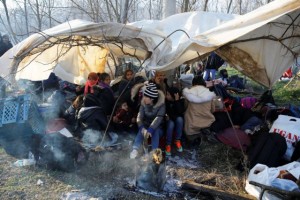 Migrants camp as they await to cross the border, near Turkey's Pazarkule border crossing with Greece's Kastanies, in Edirne, Turkey February 29, 2020. REUTERS/Umit Bektas