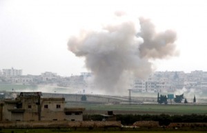 Smoke rises after an air strike in Saraqeb in Idlib province, Syria February 28, 2020. REUTERS/Umit Bektas