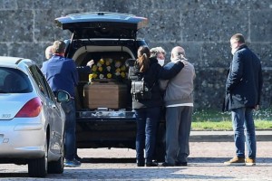 Relatives of a person who died from coronavirus disease (COVID-19) arrive at a cemetery in Bergamo, Italy March 16, 2020. REUTERS/Flavio Lo Scalzo