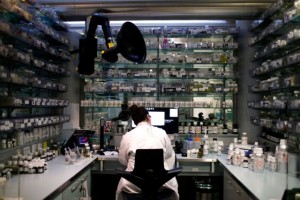 FILE PHOTO: An employee works in a laboratory of Givaudan in Paris, France, February 10, 2020. Picture taken February 10, 2020. REUTERS/Gonzalo Fuentes/File Photo